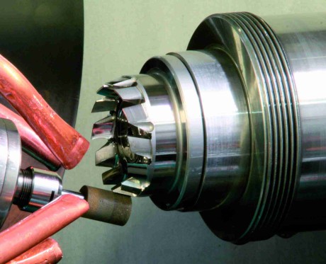 Profile grinding phase of a solid cutter for bevel gears.