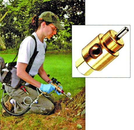 An arborist treats a tree with Quik-jet.  MAV-2C valve for the compressed air control. 